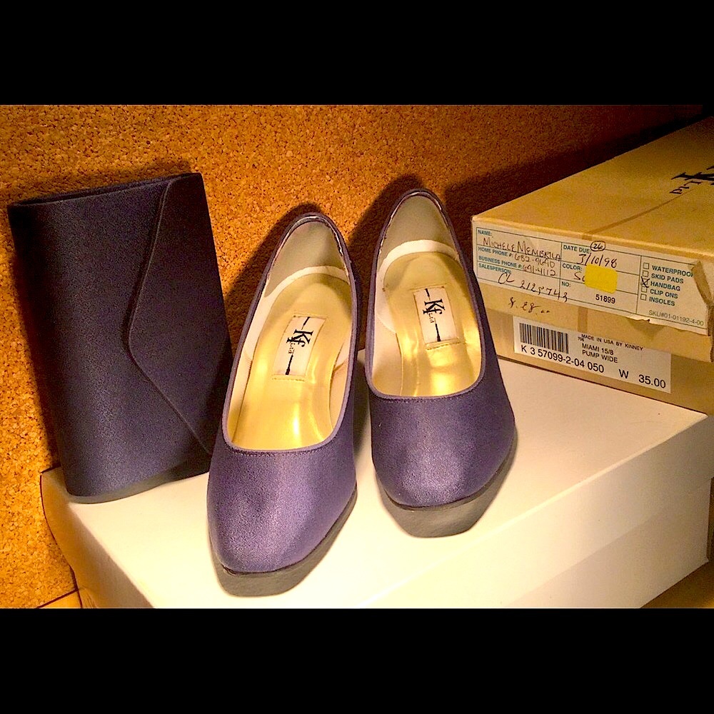 Blue pumps with matching clutch purse.